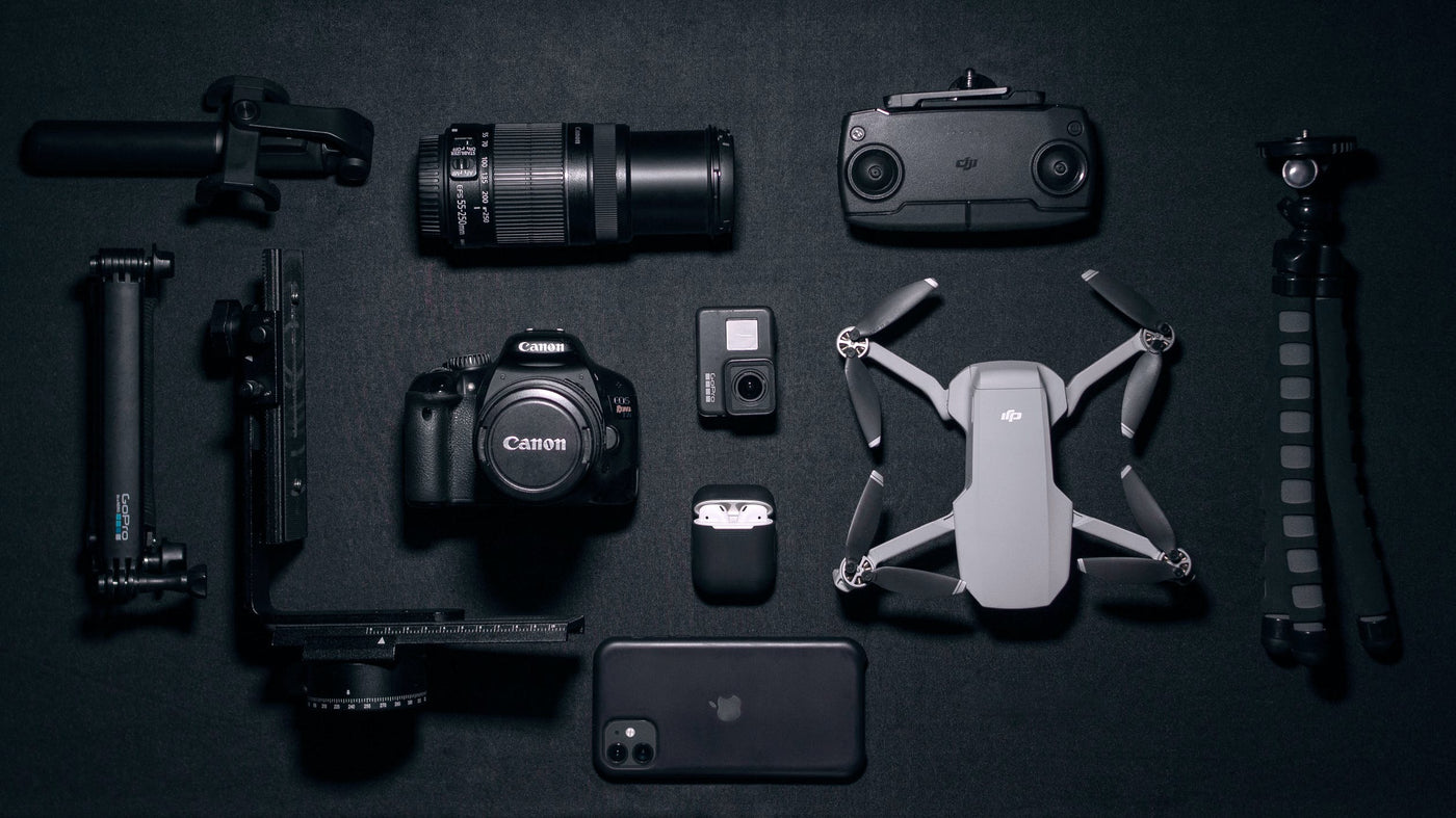 Black and Silver DSLR Camera With a Drone